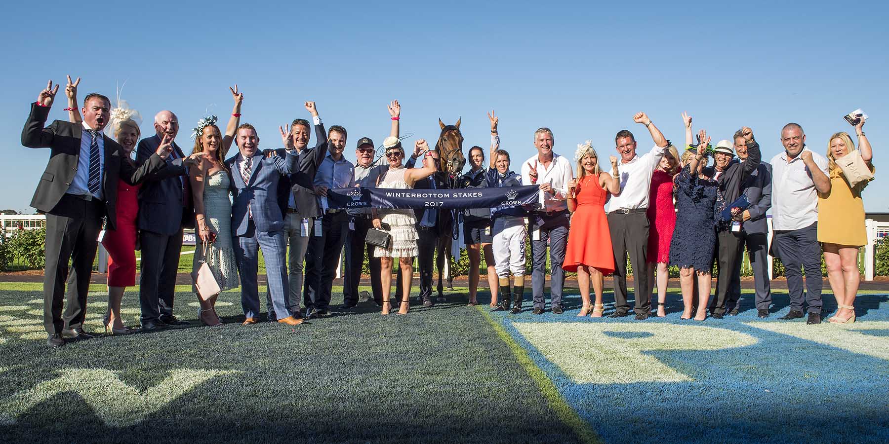 Connections of Viddora celebrate the mare's success in the Group One Winterbottom Stakes.